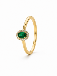 Anillo de compromiso de oro amarillo de 18 quilates con esmeralda natural de 0,23 ct y diamantes naturales talla brillante de 0,61 ct