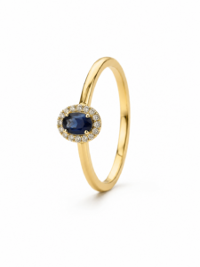 Anillo de compromiso de oro amarillo de 18 quilates con zafiro natural de 0,29 ct y diamantes naturales talla brillante de 0,0605 ct