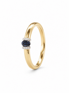 Anillo de compromiso de oro amarillo de 18 quilates con zafiro natural de 0,23 ct y diamantes naturales talla brillante de 0,037 ct