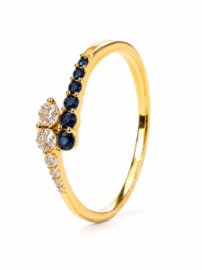 Anillo de compromiso de oro amarillo de 18 quilates con zafiros naturales de 0,47 ct y diamantes naturales talla brillante de 0,033 ct